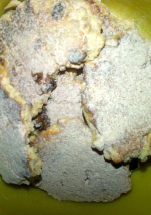 A picture of oat biscuit with cinnamon icing sugar.