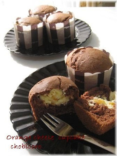 A picture of Orange and Cream Cheese Cupcakes.