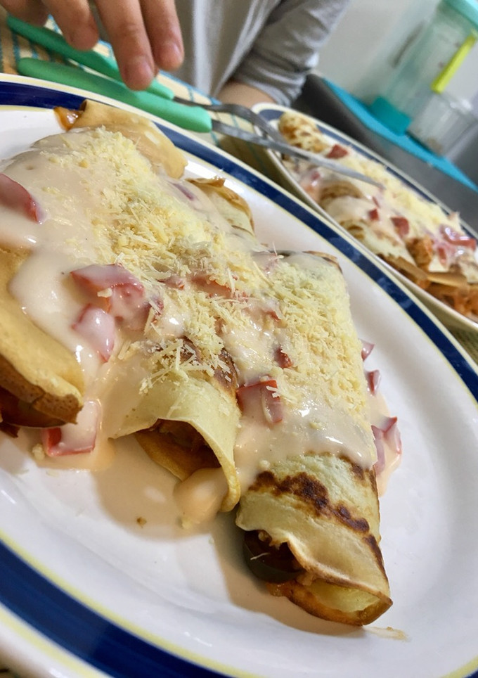 Una foto de Panqueques rellenos con carne
