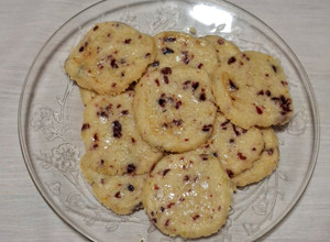 Una foto de Galletas de naranja y arándanos secos