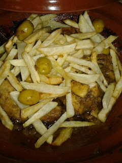 A picture of Chicken Tagine with Olives and Fried Potatoes.
