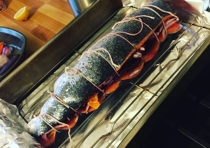 Whole roasted stuffed salmon