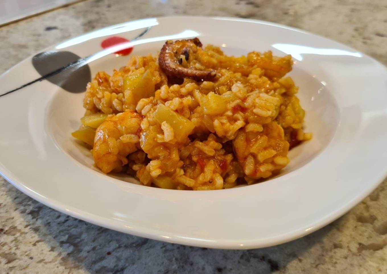 Arroz con pulpo y langostinos