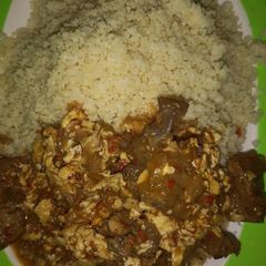 A picture of Couscous with egg Sauce.