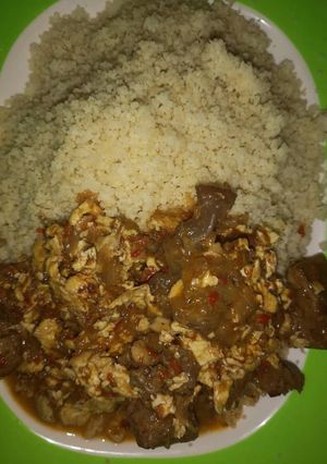A picture of Couscous with egg Sauce.