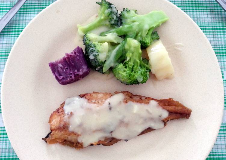 Pan seared fish fillet with vegetable and mushroom gravy