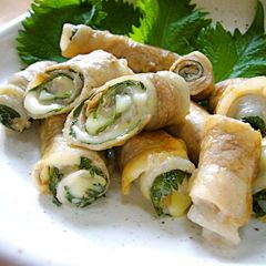 A picture of Great in Bentos- Pork Rolls with Umeboshi, Shiso Leaves, and Cheese.