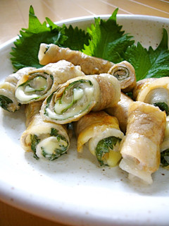 A picture of Great in Bentos- Pork Rolls with Umeboshi, Shiso Leaves, and Cheese.