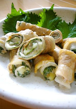 A picture of Great in Bentos- Pork Rolls with Umeboshi, Shiso Leaves, and Cheese.