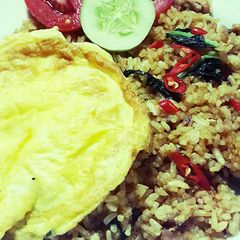 A picture of Chicken fried rice.