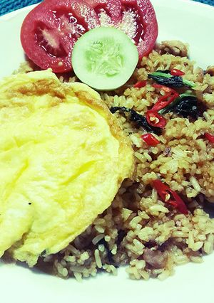 A picture of Chicken fried rice.