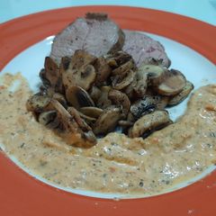 Steak with mushroom and creamy tomato sauce A picture of Steak with mushroom and creamy tomato sauce.