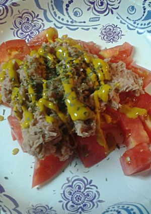 A picture of Tuna and Tomatoes.