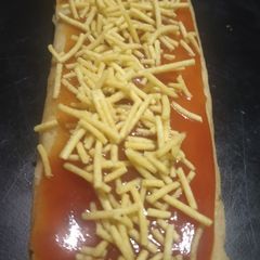 A picture of Leftover rice roti roll.