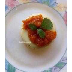 A picture of Vanilla Panna Cotta with Mango Compôte.