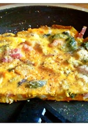 A picture of broccoli and brussel sprout omelette.