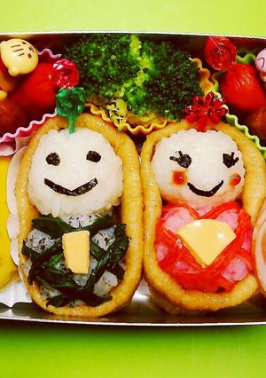 A picture of Doll's Day Bento with Inari Sushi Hina Dolls.