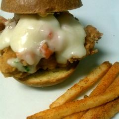 A picture of italian parm crusted slider and cajin fries.