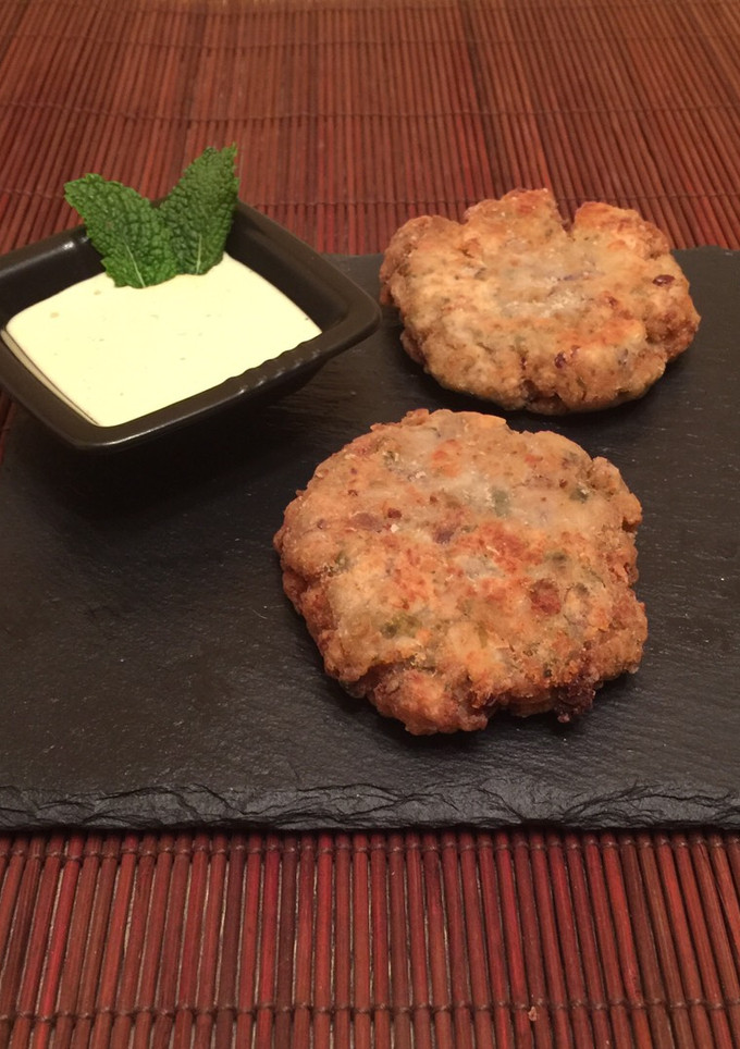 Una foto de Filetes rusos de merluza y alcaparras
