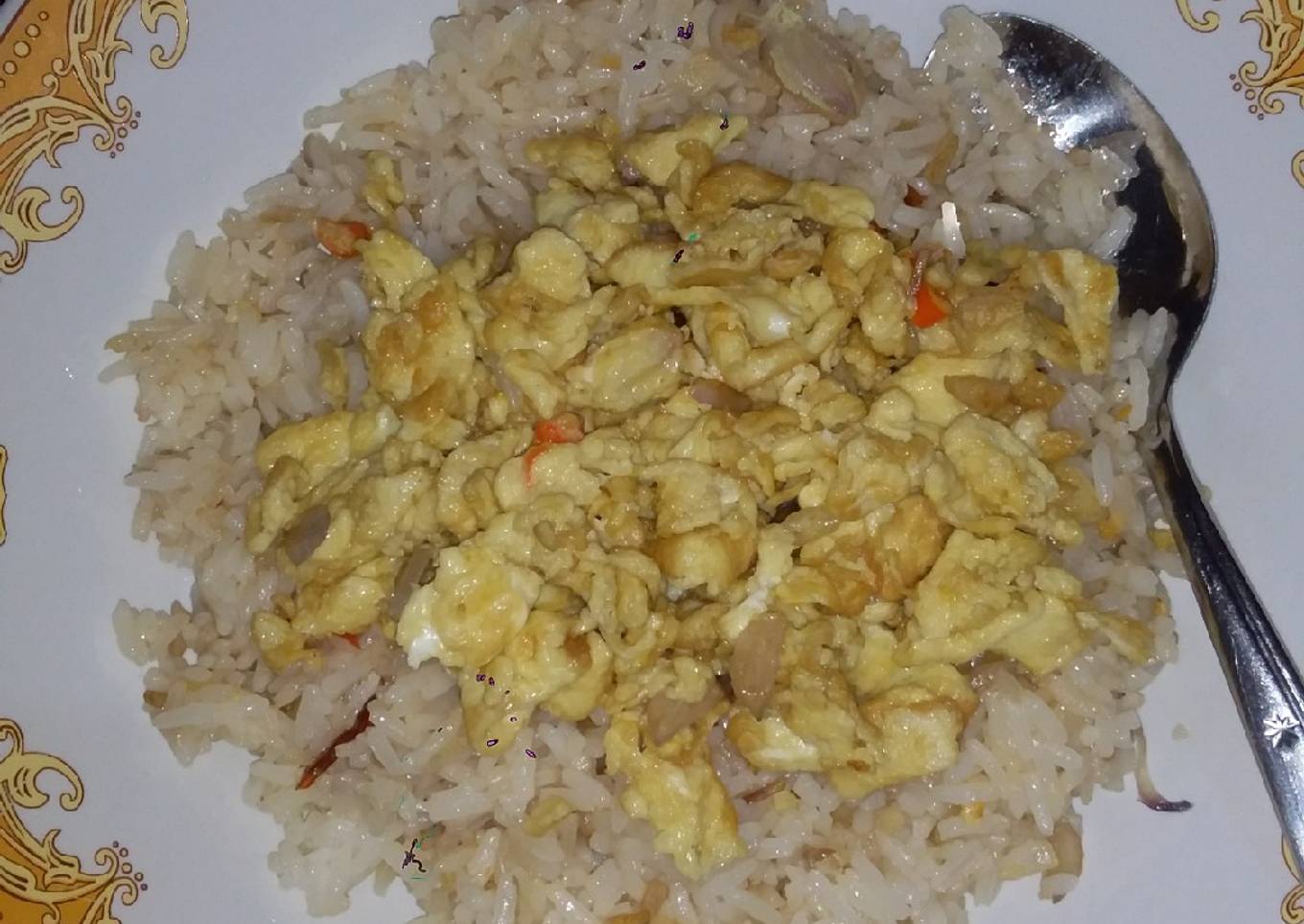 Nasi goreng mentega with telur orak arik