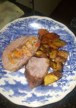 Una foto de Colita de Cuadril rellena con papas rústicas