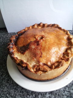 A picture of Hand Raised Pork pie.