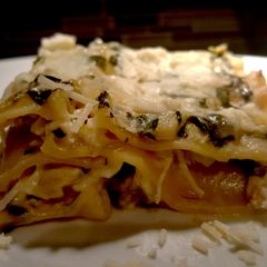 A picture of Spinach artichoke lasagna with chicken.