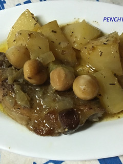 Una foto de Cabezada de cerdo al horno con nueces de Macadamia