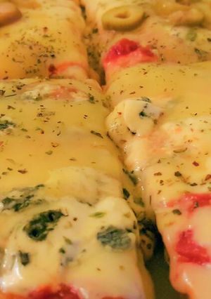 Una foto de Pizza 3 quesos al disco