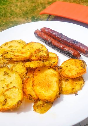 Une photo de Pommes de terre au four et merguez