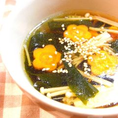 A picture of Spicy Soup with Enoki Mushrooms and Wakame Seaweed.