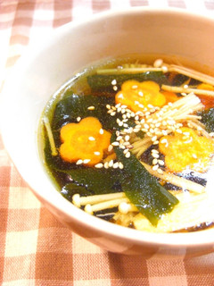 A picture of Spicy Soup with Enoki Mushrooms and Wakame Seaweed.