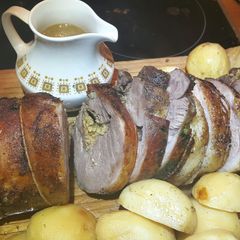Stuffed Leg Lamb, roast potatoes & gravy. A picture of Stuffed Leg Lamb, roast potatoes & gravy..