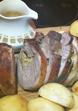 A picture of Stuffed Leg Lamb, roast potatoes & gravy..