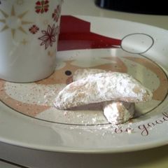 A picture of Almond Crescent cookies.