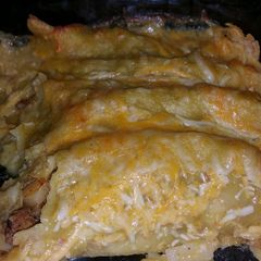 A picture of Sausage Potato and Cheese Enchiladas.