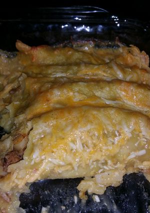 A picture of Sausage Potato and Cheese Enchiladas.