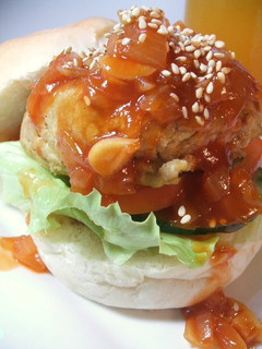 A picture of Vegetarian Burger with Sweet & Sour Sauce.