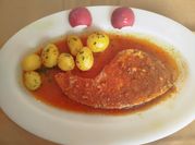 Una foto de filete a la marinera