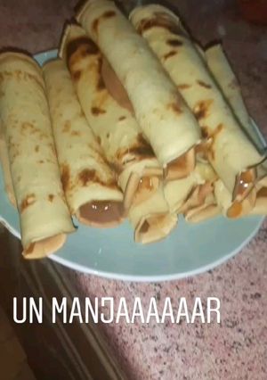 Una foto de Panqueques Con Manjar