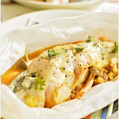 A picture of Steamed Cod Slices and Bacon with Tomato Sauce.