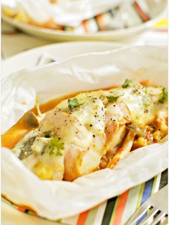 A picture of Steamed Cod Slices and Bacon with Tomato Sauce.