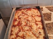 Una foto de salsa bechamel pizza