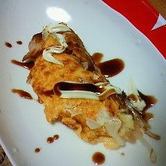 A picture of For Lunch! Bean Sprout Omelet Topped with Pork Belly.