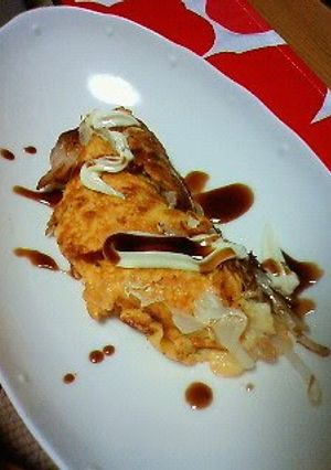A picture of For Lunch! Bean Sprout Omelet Topped with Pork Belly.