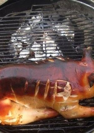A picture of One Whole Piglet BBQ'ed.
