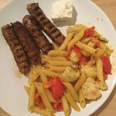 A picture of Hungry late lunch... Kebabs with penne pasta.