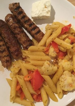 A picture of Hungry late lunch... Kebabs with penne pasta.