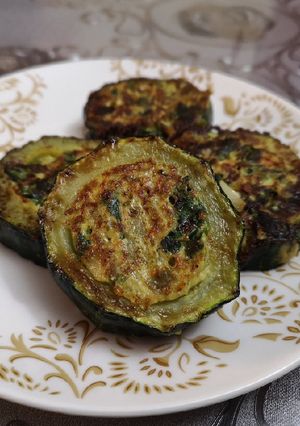 Una foto de Zucchini en medallones rellenos