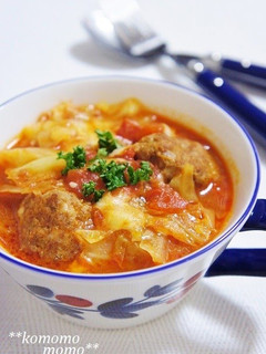 A picture of Meltingly Soft Cabbage and Meatballs Stewed in Tomatoes.